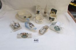 12 items of crested china including Goss