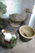 2 garden planters and 2 ducks