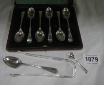 A cased set of silver teaspoons, silver sugar tongs, salt spoon and tea spoon