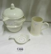 A Wedgwood food warmer a/f, a leeds mug and a tea strainer