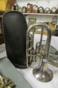 A silver plated George Potter & Co., tenor horn with mouthpiece