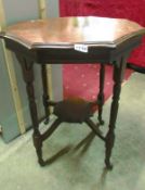 A Victorian mahogany octagonal table with piecrust edge