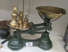 A set of kitchen scales with weights