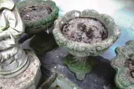 A pair of garden urns