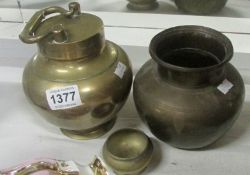 A lidded brass pot and 2 others