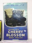 A large Cherry Blossom boot polish sign