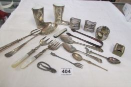 A mixed lot of cutlery, napkin rings etc