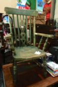 A green stained Windsor chair