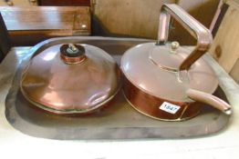 A copper kettle, copper tray and copper hot water bottle