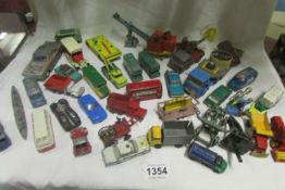 A box of mixed playworn diecast Dinky, Corgi, Matchbox toys