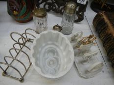 A Jelly mould, toast rack, cruet jars etc