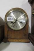 An oak mantel clock