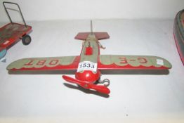 A tinplate clockwork aeroplane, (possibly Chad Valley)