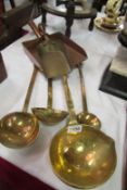 A set of 4 Georgian brass ladles and 2 old shovels