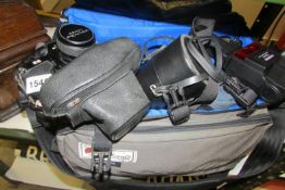 A vintage Pentax camera and accessories in case