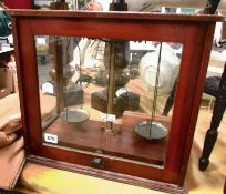 A cased set of apothecary scales