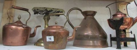 3 copper kettles, a copper jug and a brass trivet