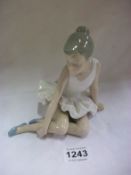 A NAO seated ballerina