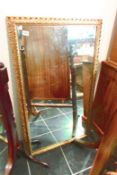 A gilt framed mirror