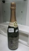 A bottle of commemorative Brut champagne