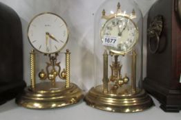 2 Anniversary clocks, 1 missing dome