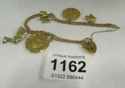 An 1892 Austrian gold florin, 1876 gold 10 gilders, 9ct gold wrist chain and 3 gold charms