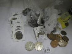 A tin of mixed copper and other coins including 2 x Â£5 coins
