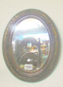 A small oval mirror