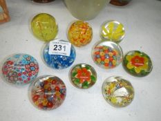 10 glass paperweights including millifiori