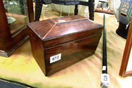 A Victorian mahogany tea caddy