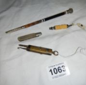 A miniature ivory pencil and 3 other items