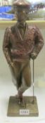 An old chalk figure of a golfer