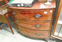 A mahogany 3 drawer bow front chest of drawers