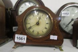 A small oak mantel clock