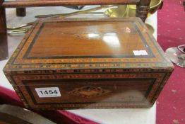 An inlaid box and contents