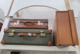 3 vintage suitcases