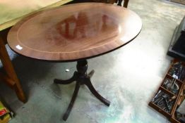 A small oval inlaid table