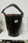 An old leather fire man's bucket