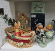 A Pendelfin boat, motorcycle & sidecar, house and 2 rabbits