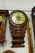 A Victorian inlaid wall clock