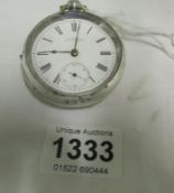 A silver Waltham pocket watch (missing glass)