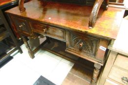 A carved oak sideboard