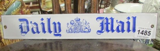 An enamel 'Daily Mail' sign