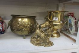 A brass jardiniere, wine cooler and stag group