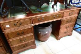 A mahogany double pedestal desk