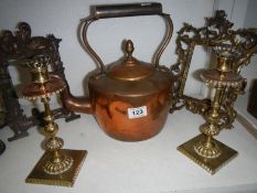 A copper kettle, pair of brass candlesticks & 2 photo frames