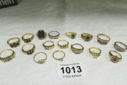 A quantity of yellow metal rings set different stones
