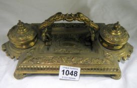 A 19th century French brass desk inkstand