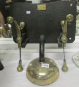 A brass and steel bell from  Boston Corn Exchange