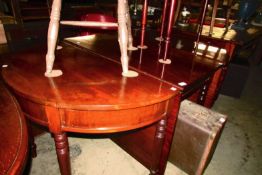 A Georgian mahogany dining table consisting of 2 'D' ends and drop leaf centre (clips in office)
